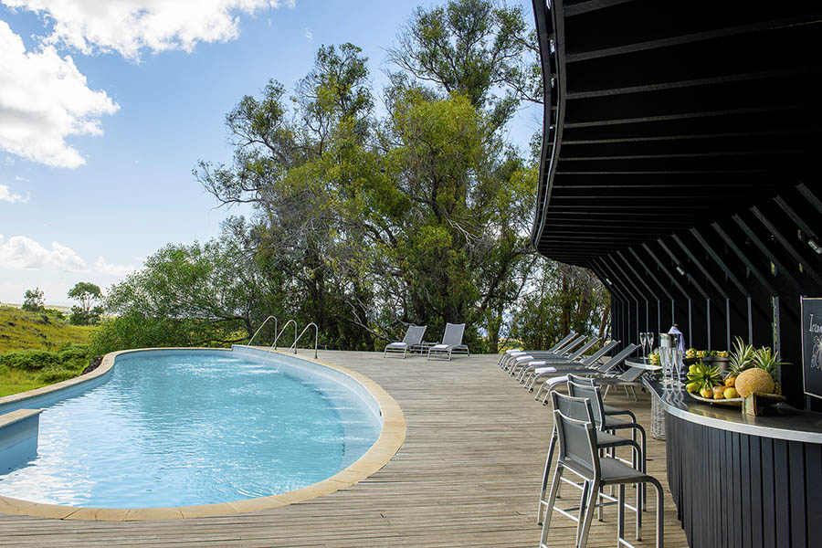 Relax by the pool at the Explora Rapa Nui | Photo credit: Explora Hotels