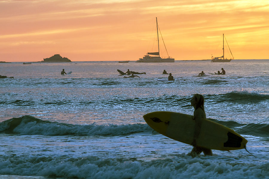 Surfers on Tamarindo beach, Costa Rica