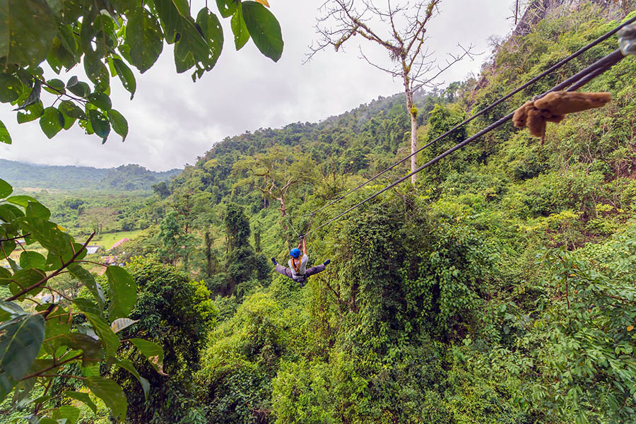 Go zip lining through the lush jungle 