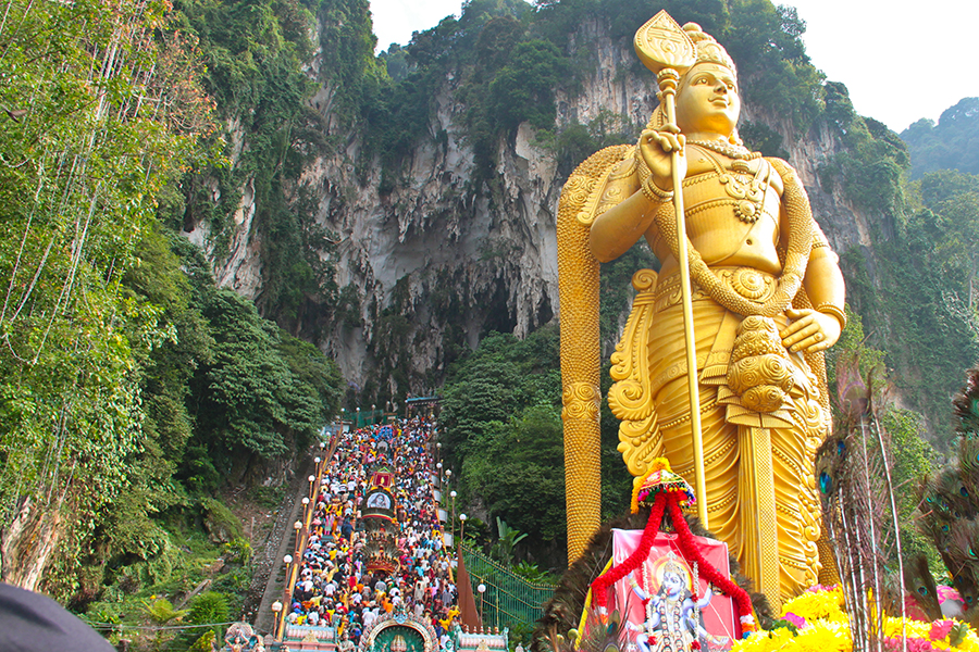 Climb the 272 steps to reach the must see Batu Caves!