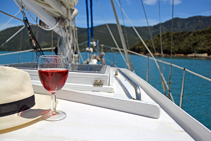 Enjoying a glass of wine, Marlborough Sounds, South Island, New Zealand